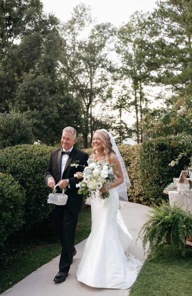 Bride walking down the aisle with father